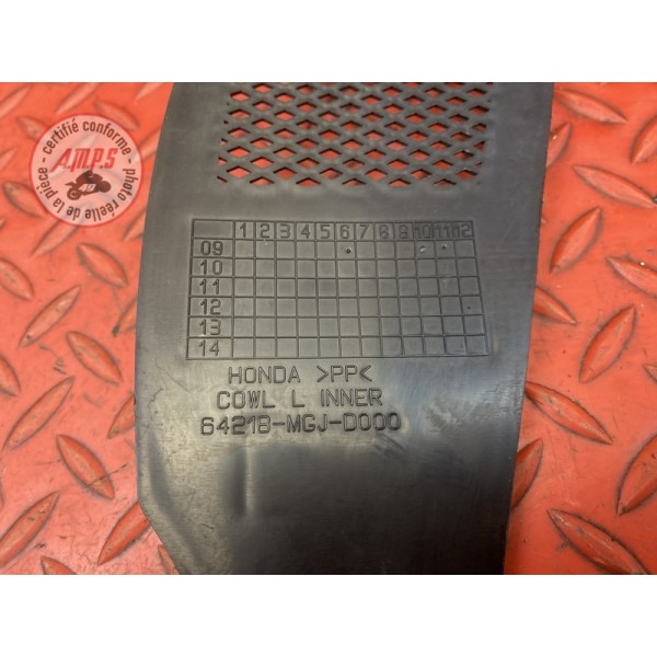 Cache plastique avant gauche 
