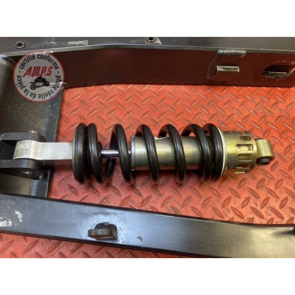 Bras oscillant avec amortisseur 