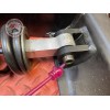Bras oscillant avec amortisseur 
