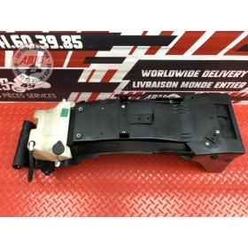 Passage de roue avec bocal de liquide 